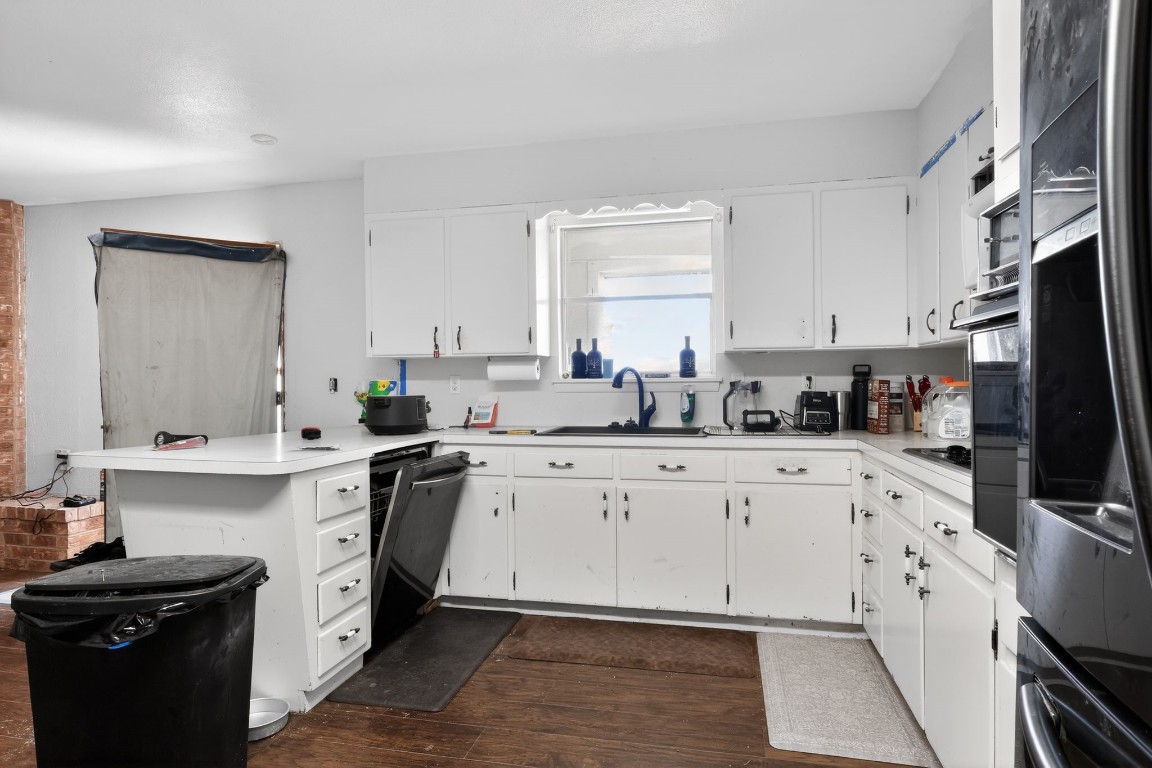 2709 Rebecca Drive Big Spring, TX 79720 - Photo 33 of 50 a kitchen with stainless steel appliances a sink stove and cabinets