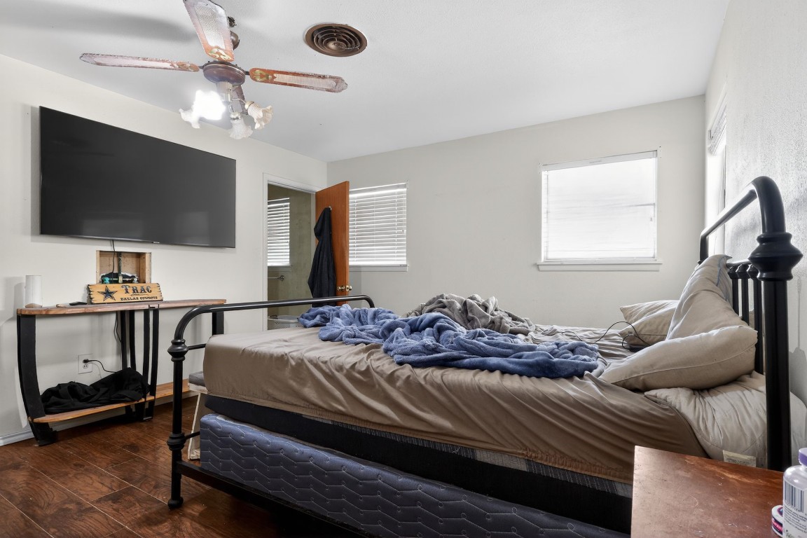 2709 Rebecca Drive Big Spring, TX 79720 - Photo 40 of 50 a bedroom with a bed and a flat screen tv