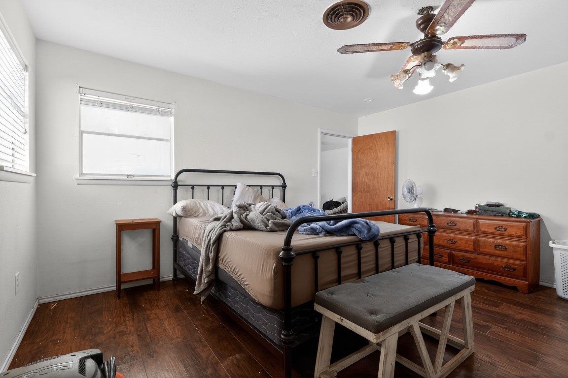 2709 Rebecca Drive Big Spring, TX 79720 - Photo 41 of 50 a bedroom with a bed and a chandelier