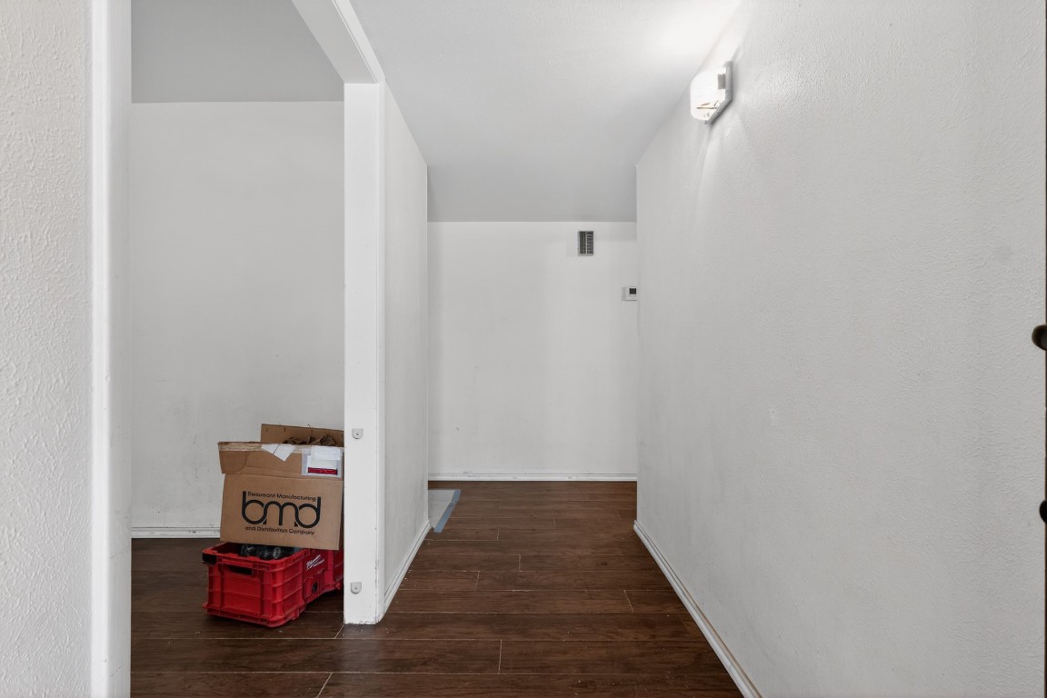2709 Rebecca Drive Big Spring, TX 79720 - Photo 47 of 50 a view of a hallway with wooden floor