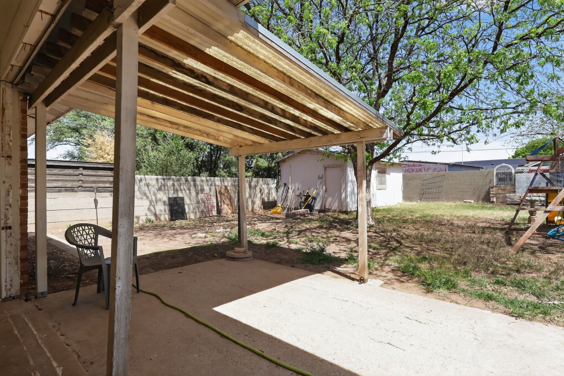 2709 Rebecca Drive Big Spring, TX 79720 - Photo 10 of 50 a view of a porch with furniture and a yard
