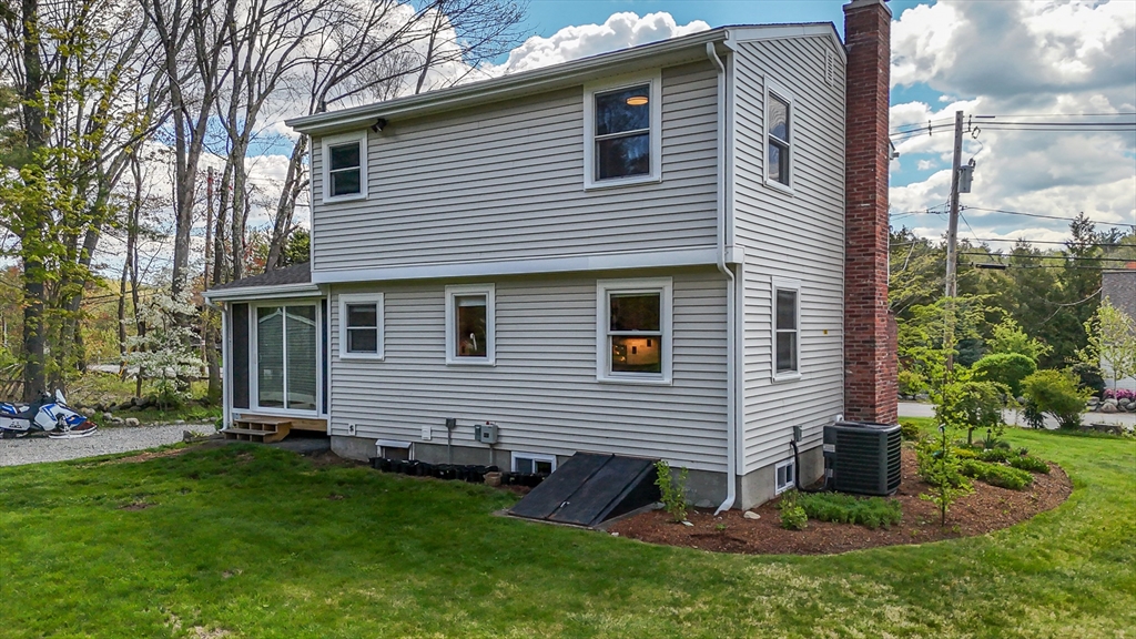 196 Center Street Groveland, MA 01834 - Photo 27 of 32 a view of a house with a yard