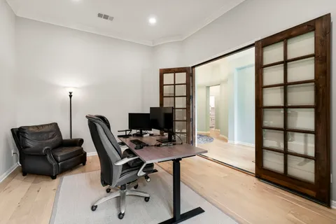 a view of dining area with cabinets
