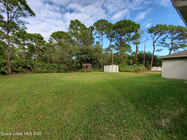 a view of a golf course with a garden