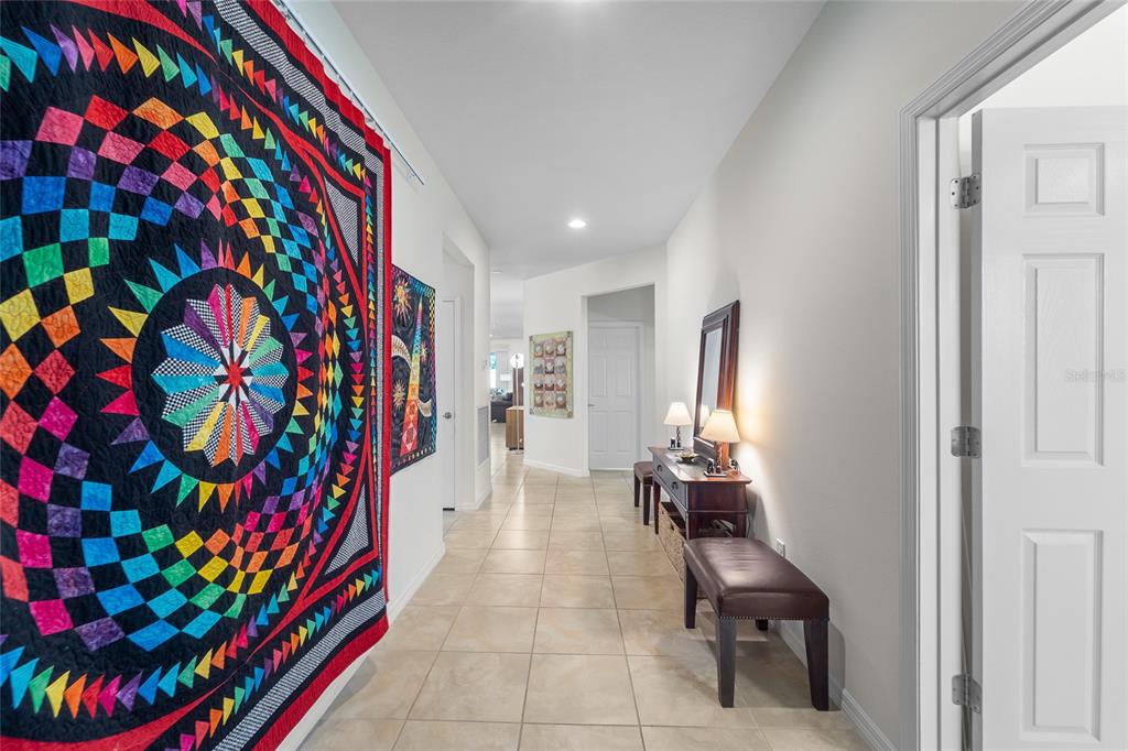 6306 Kenava Loop Palmetto, FL 34221 - Photo 20 of 31 a room that has a rug and a chair