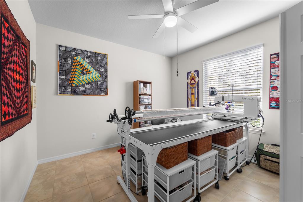 6306 Kenava Loop Palmetto, FL 34221 - Photo 21 of 31 a kitchen with a stove and a refrigerator