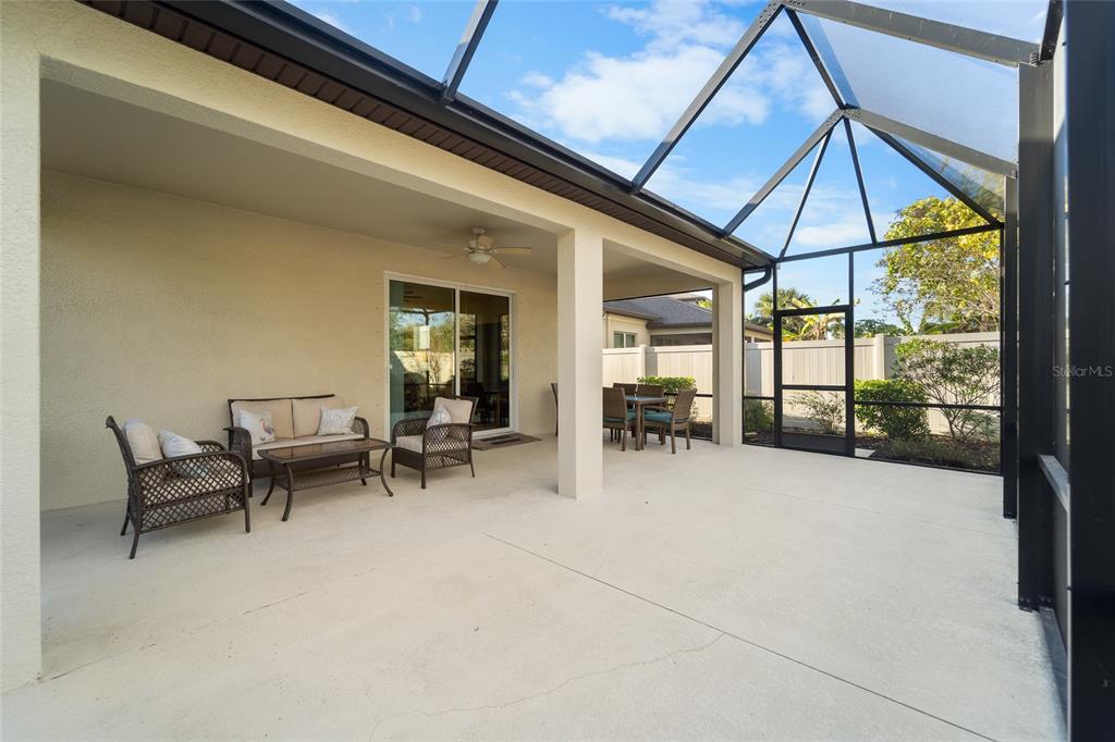 6306 Kenava Loop Palmetto, FL 34221 - Photo 25 of 31 a view of a dining room with furniture window and outside view