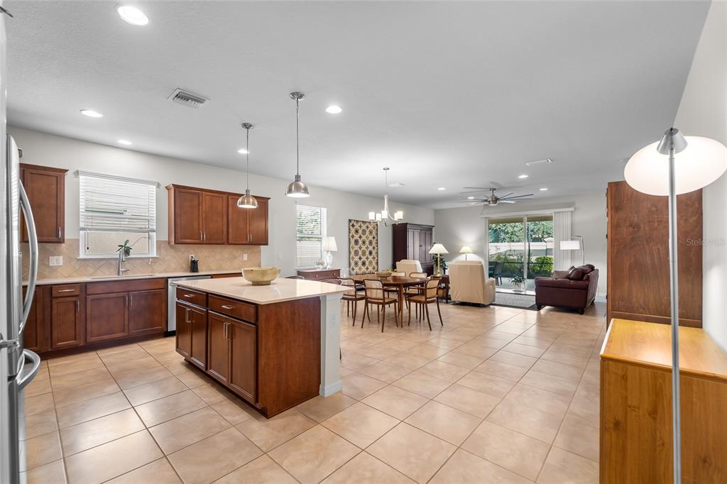 6306 Kenava Loop Palmetto, FL 34221 - Photo 4 of 31 a kitchen with lots of counter top space