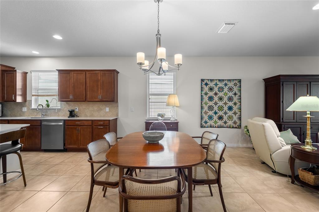 6306 Kenava Loop Palmetto, FL 34221 - Photo 7 of 31 a view of a dining room with furniture and window