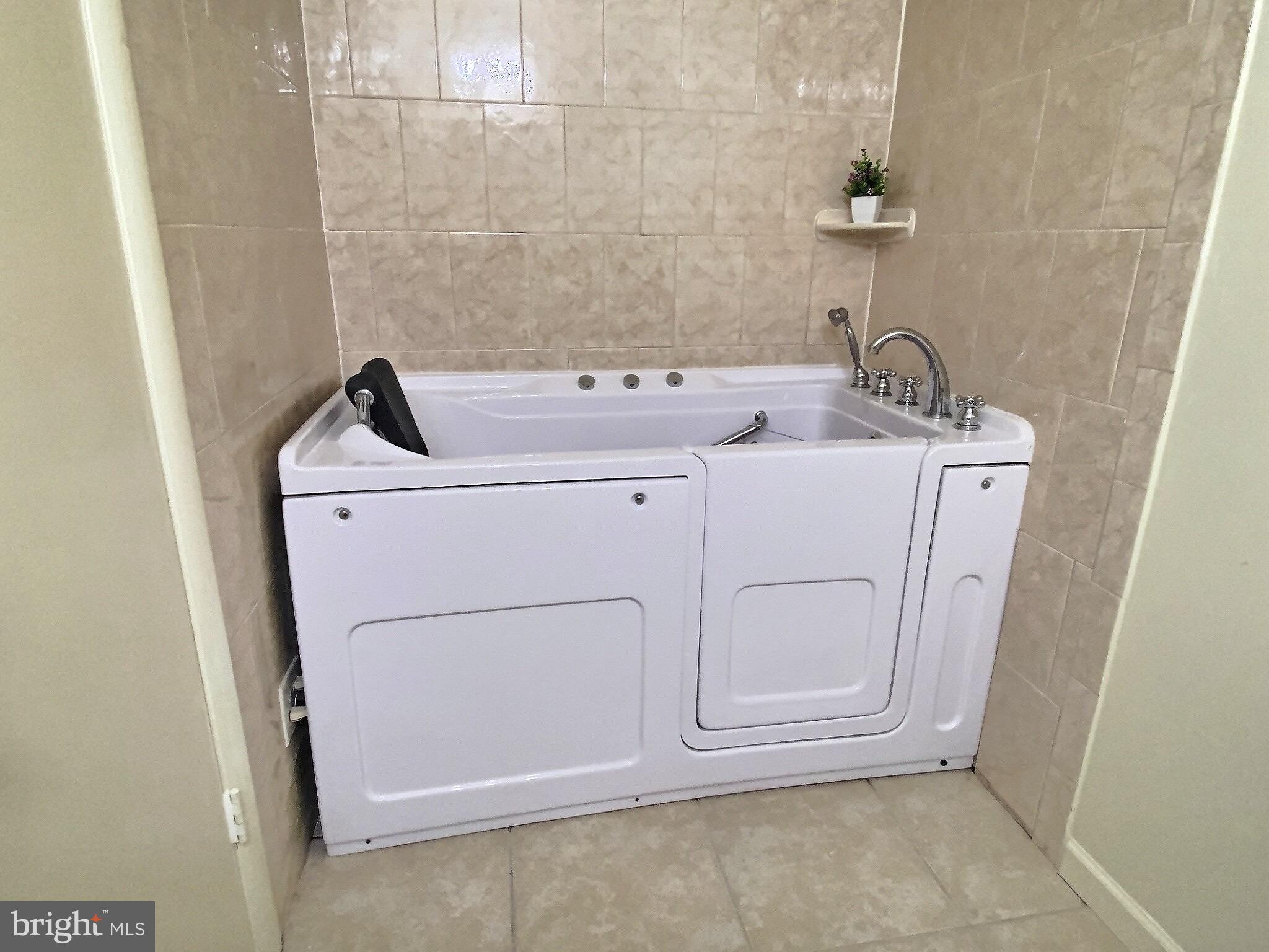 6570 Cornell Road Bryans Road, MD 20616 - Photo 8 of 19 Master bath walk-in jetted spa tub