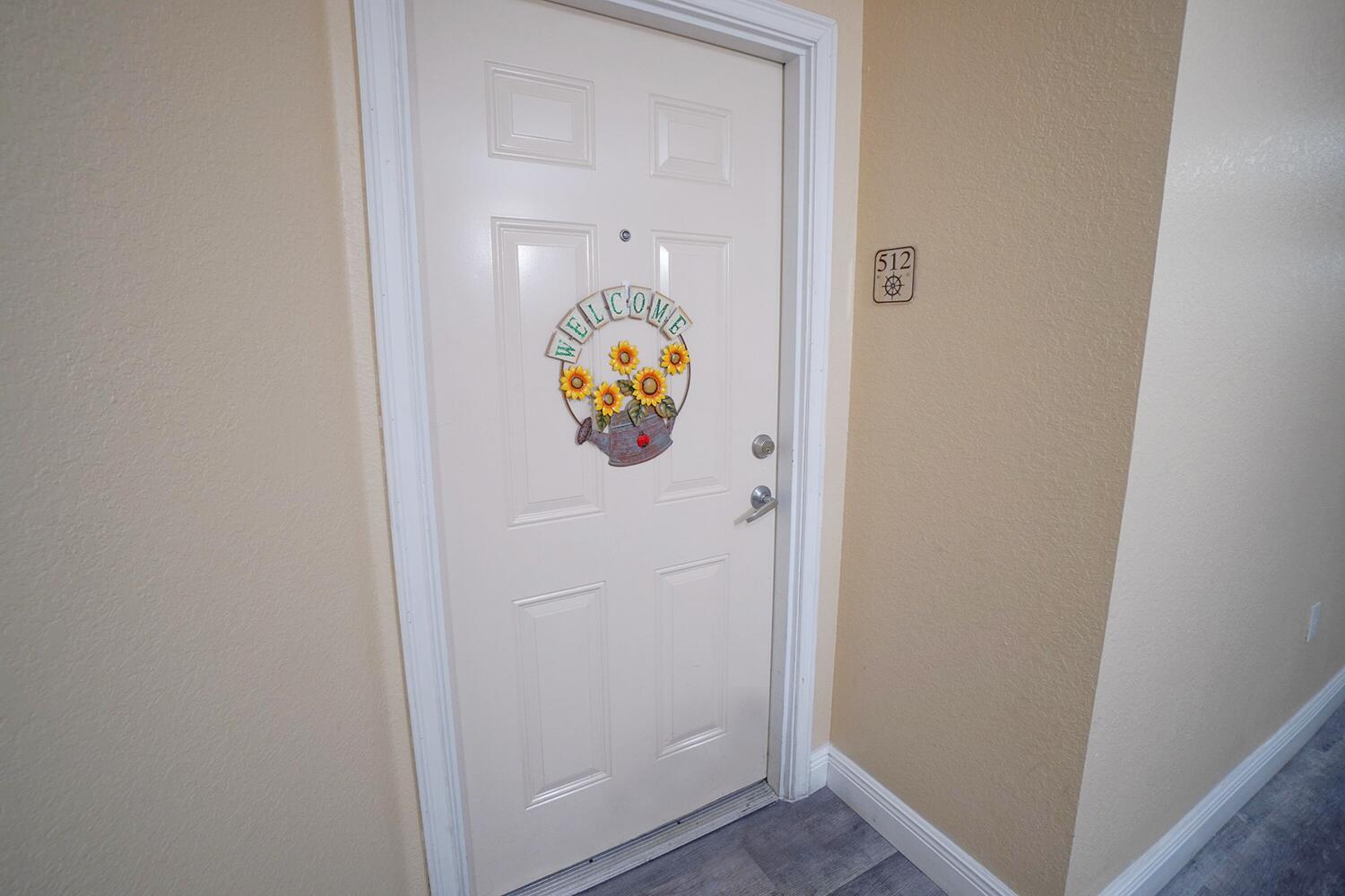 2415 Northwest 16th St Road, Unit 512 Miami, FL 33125 - Photo 15 of 17 a utility room with window and stairs