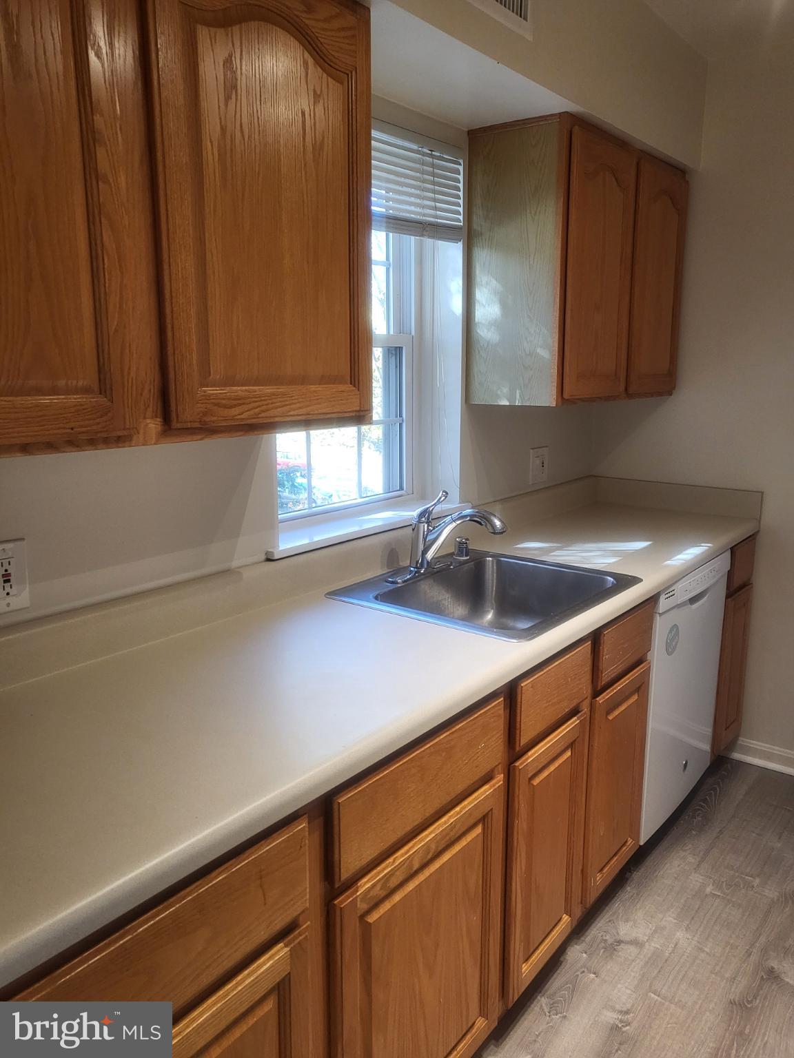 3279 South Stafford Street, Unit B1 Arlington, VA 22206 - Photo 15 of 39 a kitchen with a sink and cabinets