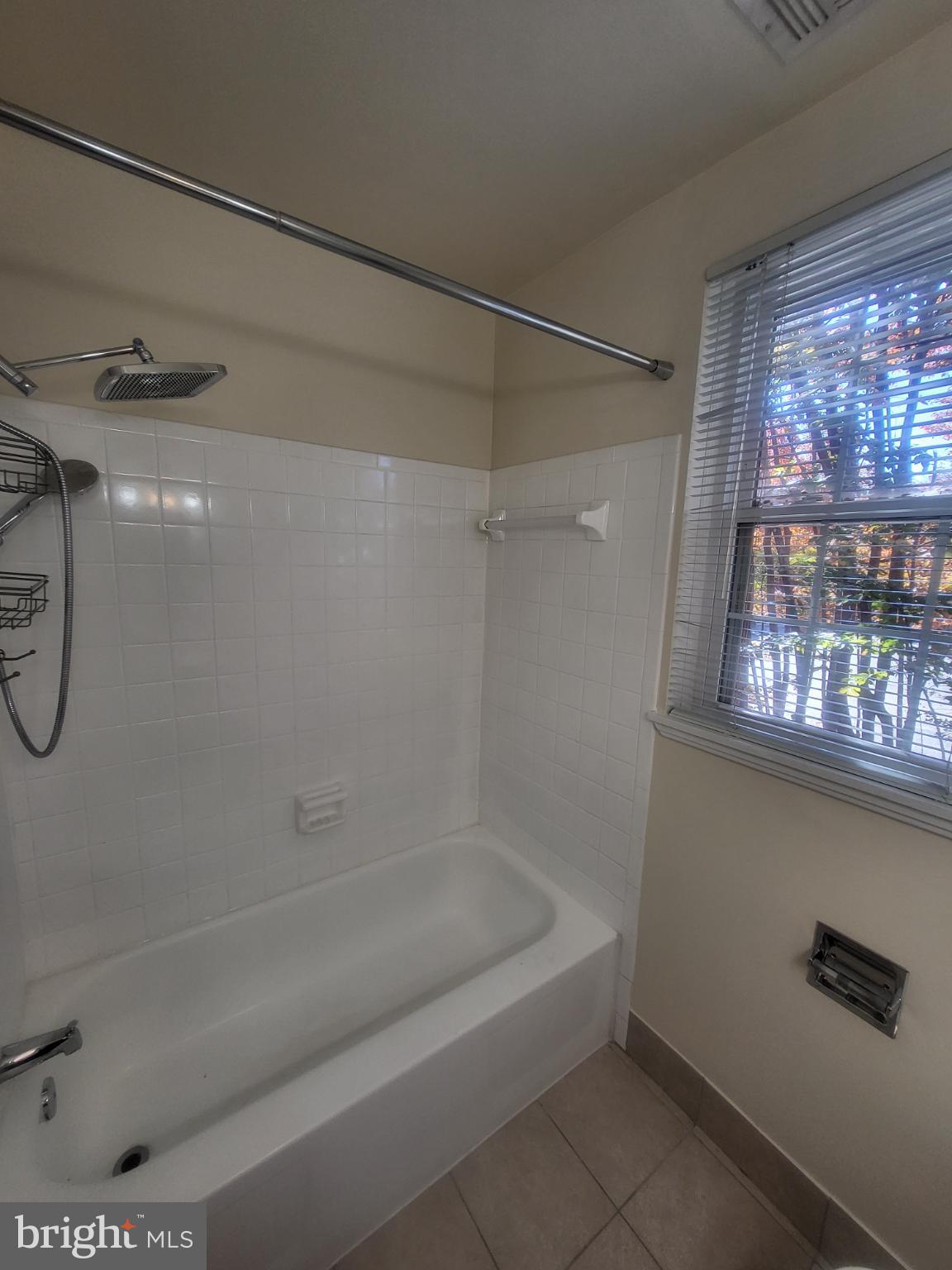 3279 South Stafford Street, Unit B1 Arlington, VA 22206 - Photo 22 of 39 a bathroom with a shower and a bathtub