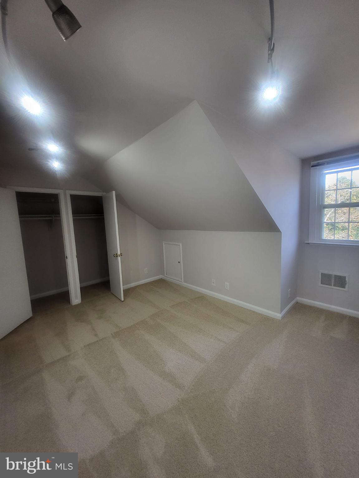 3279 South Stafford Street, Unit B1 Arlington, VA 22206 - Photo 27 of 39 an empty room with a empty space and windows