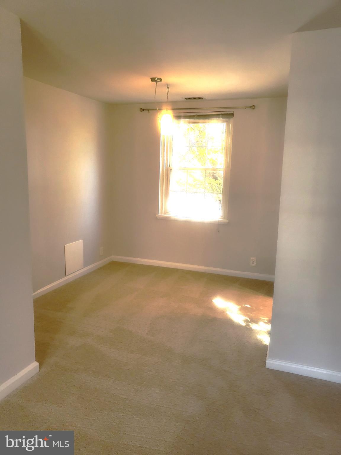3279 South Stafford Street, Unit B1 Arlington, VA 22206 - Photo 8 of 39 a view of an empty room and window