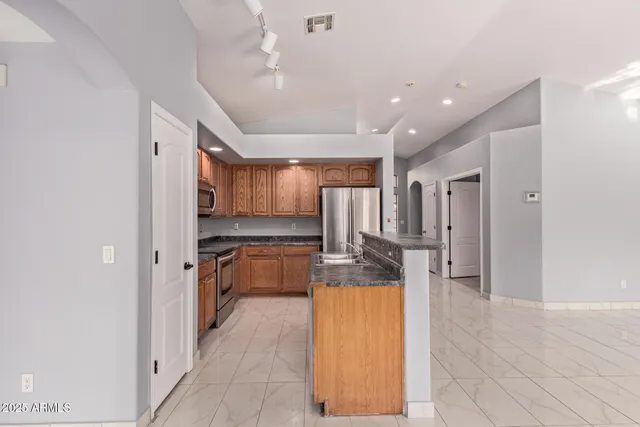 a large bathroom with a tub and shower