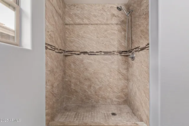 a close view of a bathroom shower
