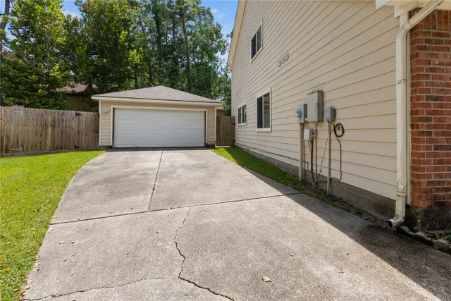 a view of a back yard of the house