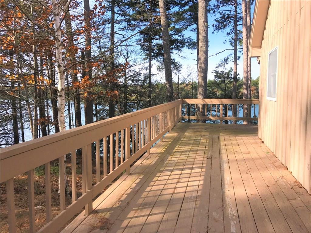 422 Princes Point Road Brunswick, ME 04011 - Photo 3 of 23 A 2-sided deck wraps from the side...