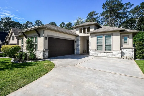 $599,000 | 604 Castlewood Cove Lane, Pinehurst, TX 77362