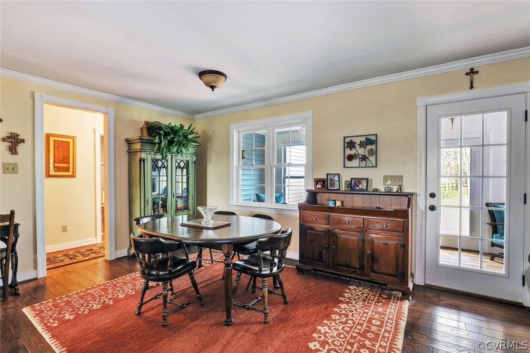4515 Three Chopt Road Gum Spring, VA 23065 - Photo 15 of 36 a dining room with furniture and wooden floor