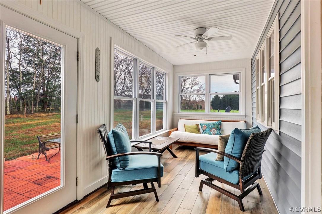 4515 Three Chopt Road Gum Spring, VA 23065 - Photo 29 of 36 a living room with furniture and a large window