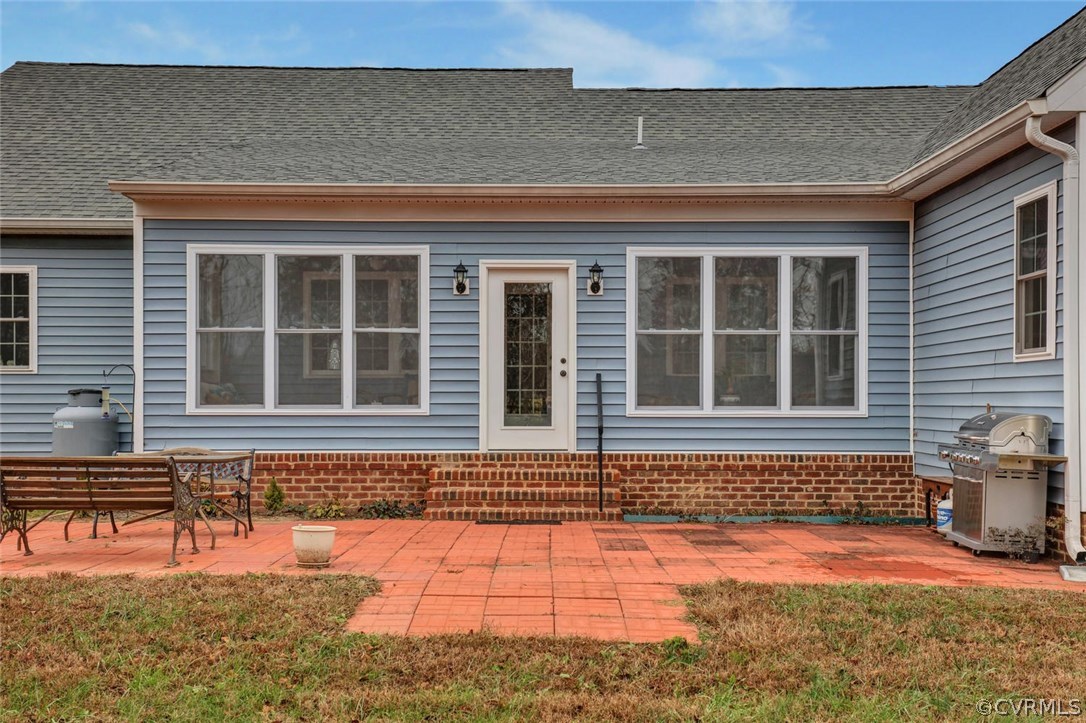 4515 Three Chopt Road Gum Spring, VA 23065 - Photo 32 of 36 a front view of a house with a yard