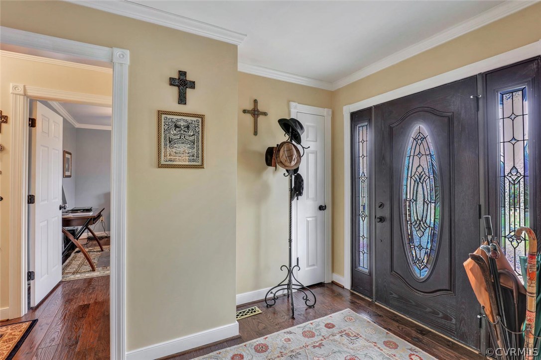 4515 Three Chopt Road Gum Spring, VA 23065 - Photo 4 of 36 a view of a hallway with entryway and wooden floor
