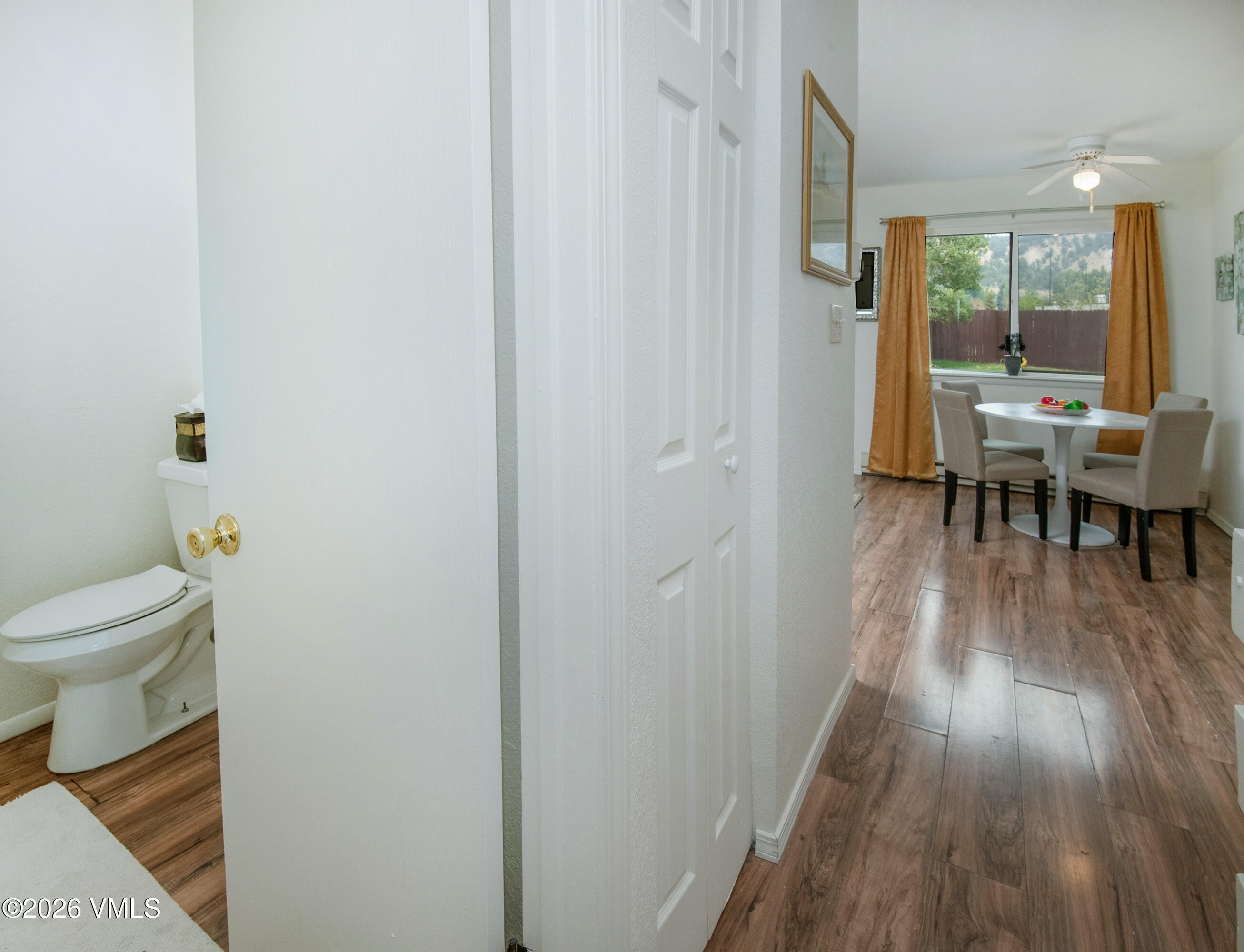 85 Chambers Avenue, Unit 10 Eagle, CO 81631 - Photo 9 of 41 a bathroom with a toilet and a hardwood floor