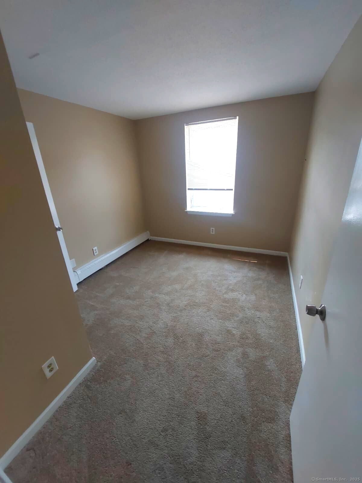 63 Huntington Street, Unit 2B Hartford, CT 06105 - Photo 2 of 6 an empty room with a window