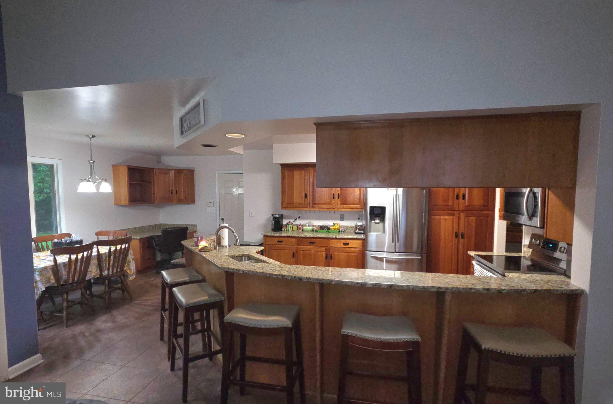 151 Martz Road Sykesville, MD 21784 - Photo 12 of 74 Inviting kitchen with warm wood tones.