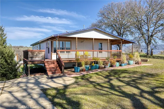 a front view of a house with patio