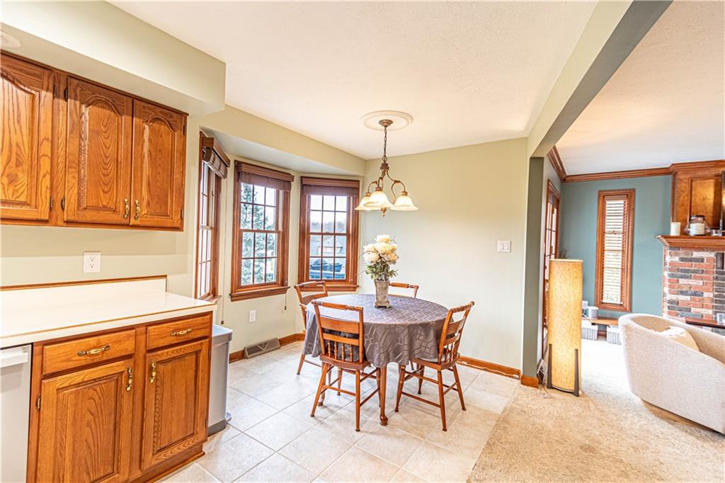 331 Cobblestone Circle McKees Rocks, PA 15136 - Photo 11 of 44 a dining room with furniture and window