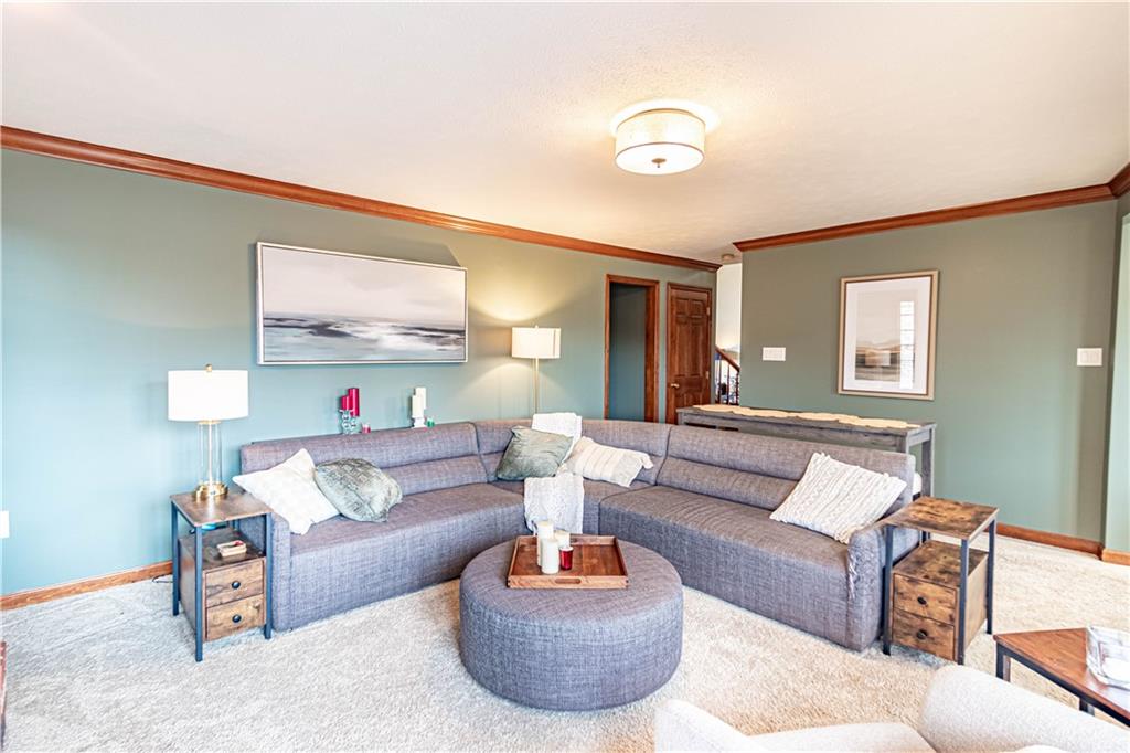 331 Cobblestone Circle McKees Rocks, PA 15136 - Photo 15 of 44 a living room with furniture and a wooden floor