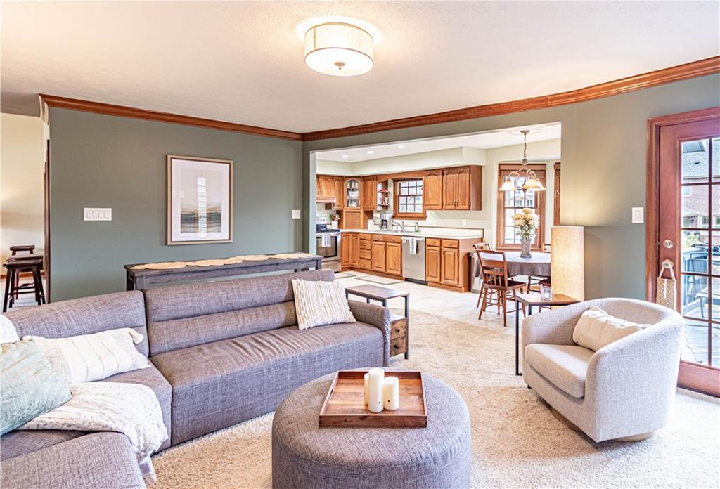 331 Cobblestone Circle McKees Rocks, PA 15136 - Photo 16 of 44 a living room with furniture and a large window