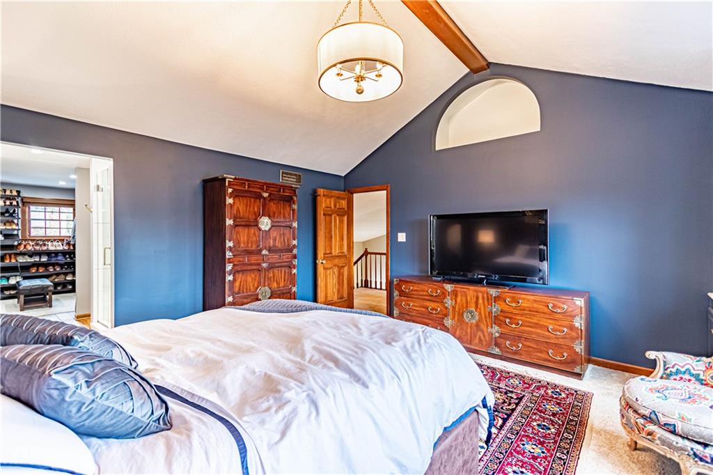 331 Cobblestone Circle McKees Rocks, PA 15136 - Photo 24 of 44 a bedroom with a bed and a flat screen tv