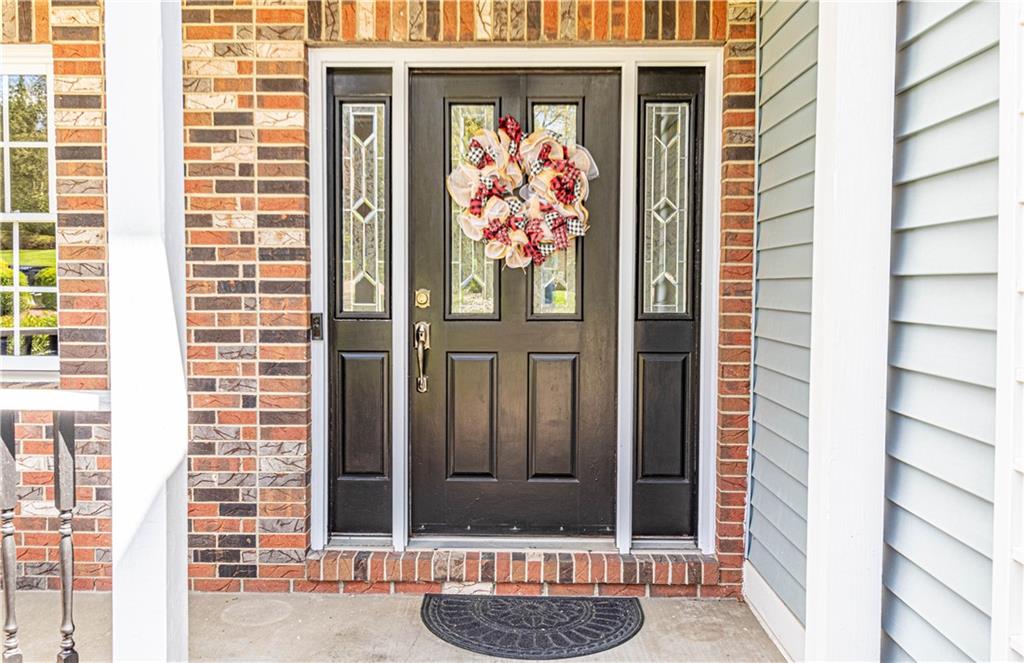 331 Cobblestone Circle McKees Rocks, PA 15136 - Photo 3 of 44 a view of front door of house with potted plant