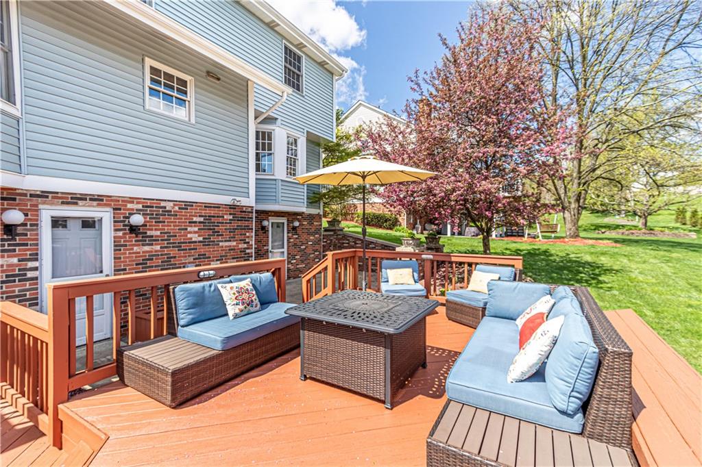 331 Cobblestone Circle McKees Rocks, PA 15136 - Photo 34 of 44 a view of a patio with couches and pool