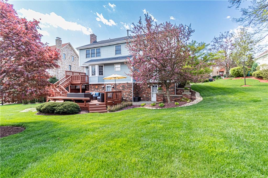 331 Cobblestone Circle McKees Rocks, PA 15136 - Photo 42 of 44 a view of a house with a big yard and potted plants
