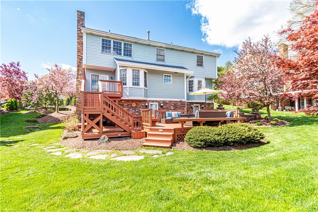 331 Cobblestone Circle McKees Rocks, PA 15136 - Photo 43 of 44 a front view of a house with garden and sitting area