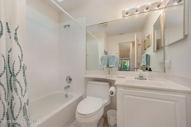 a bedroom with a workspace