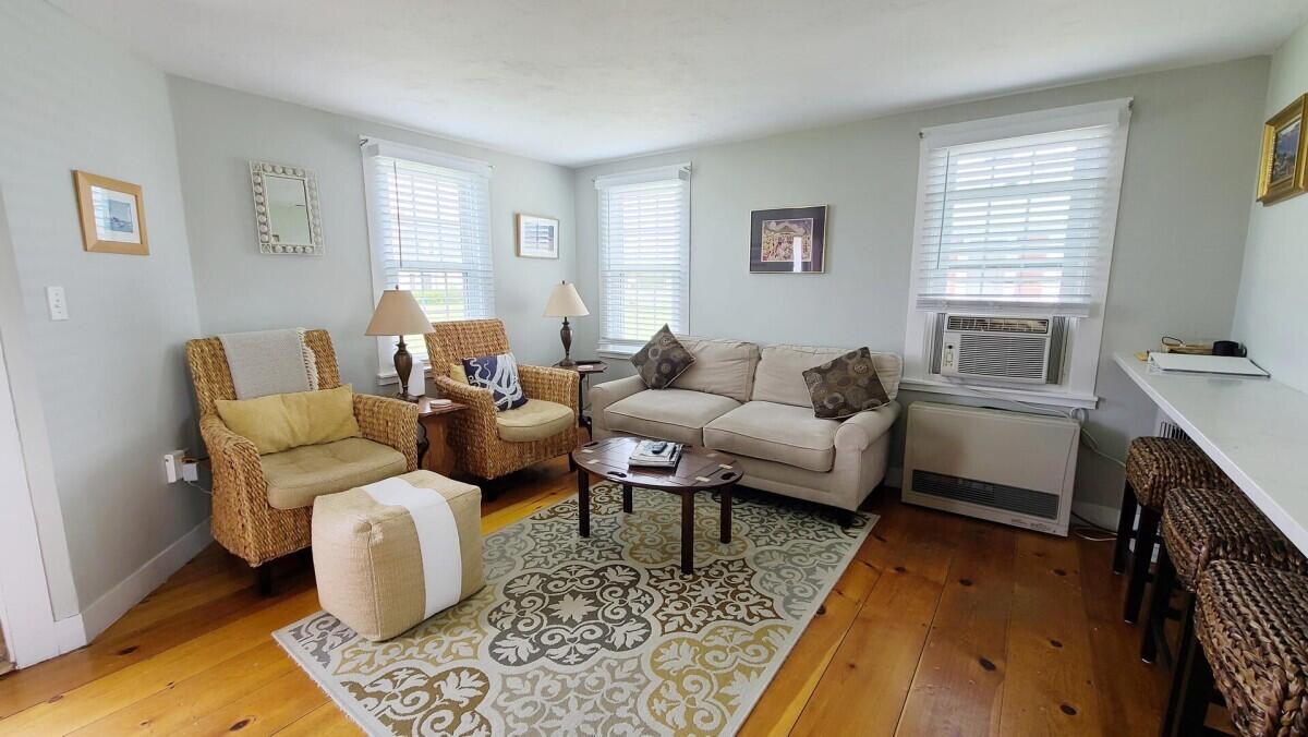 670 Shore Road, Unit 5 Truro, MA 02666 - Photo 8 of 22 a living room with furniture and a rug