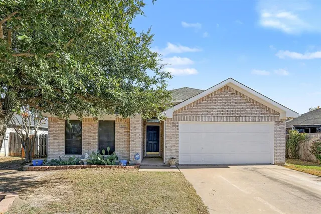 front view of a house with a patio