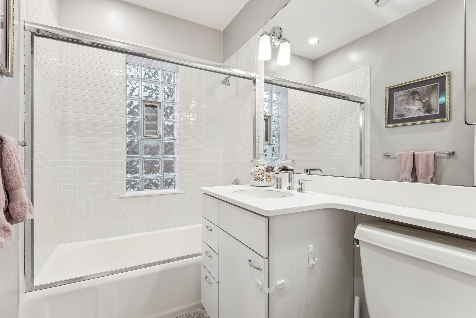 61 Ridge Road Highland Park, IL 60035 - Photo 20 of 25 a bathroom with a sink and a mirror