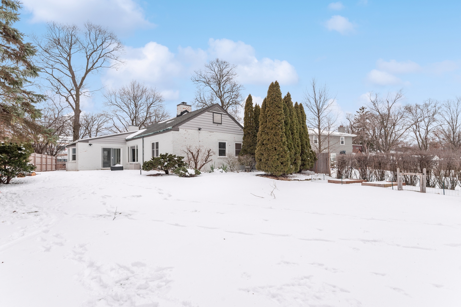 61 Ridge Road Highland Park, IL 60035 - Photo 23 of 25 a view of a house covered in snow