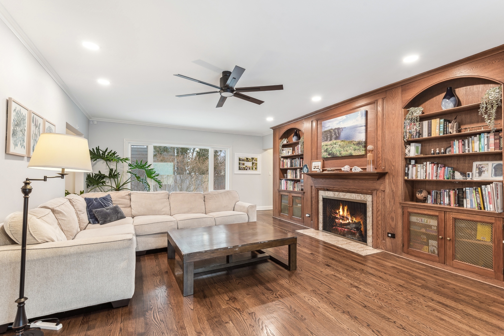 61 Ridge Road Highland Park, IL 60035 - Photo 6 of 25 a living room with furniture and a fireplace