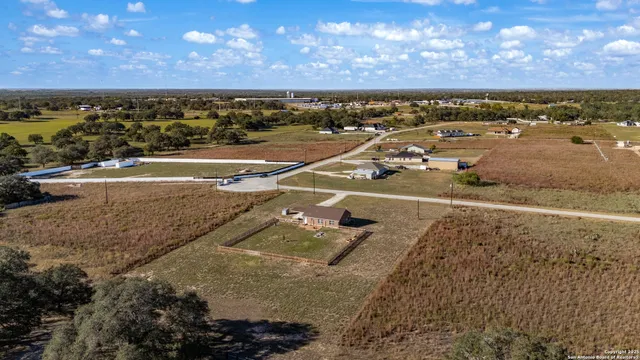 a view of a swimming pool and an outdoor space
