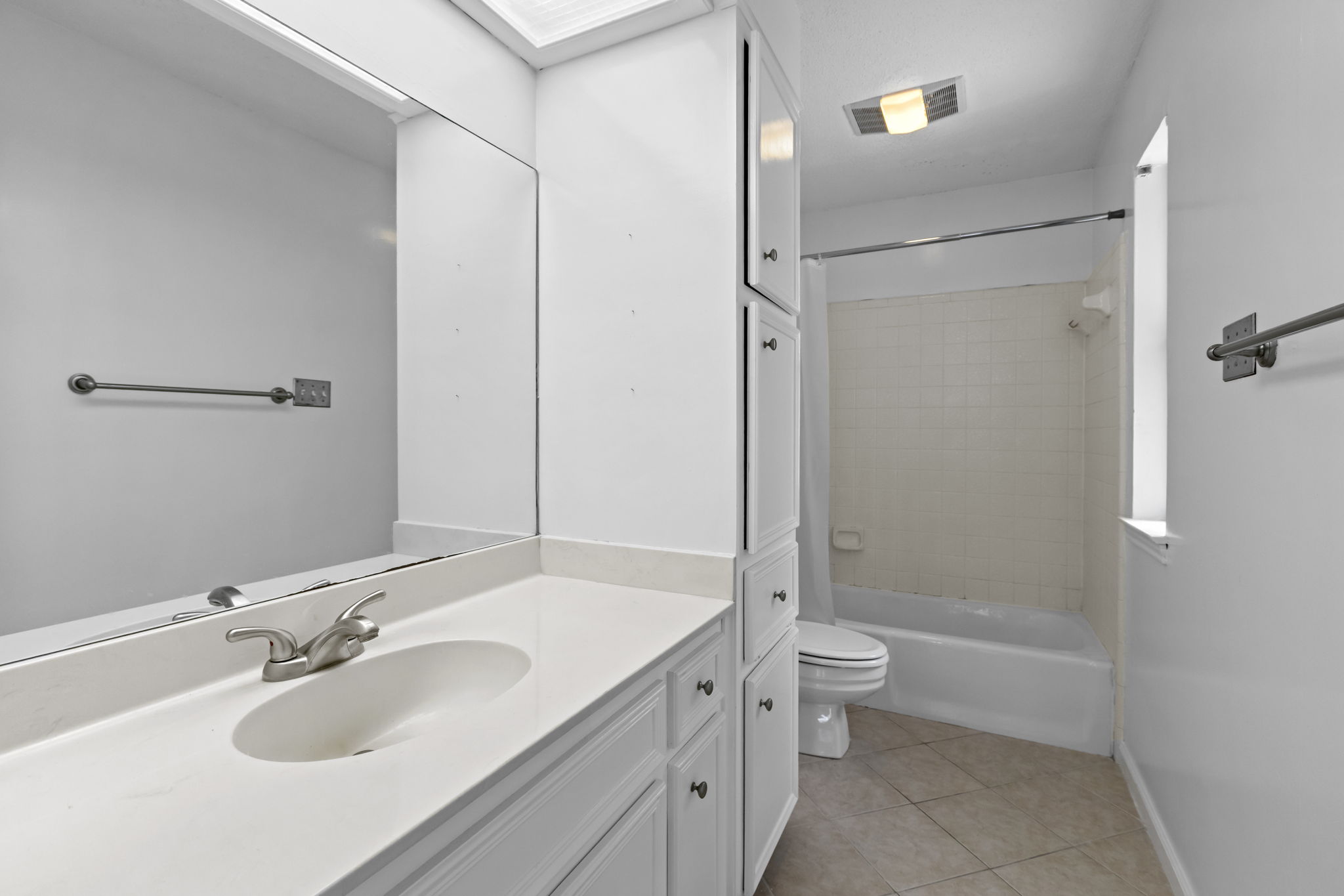 3845 Ranch Road 2222, Unit 26/M2 Austin, TX 78731 - Photo 9 of 21 The primary bathroom on the 2nd level has large sink area and lots of cabinets.