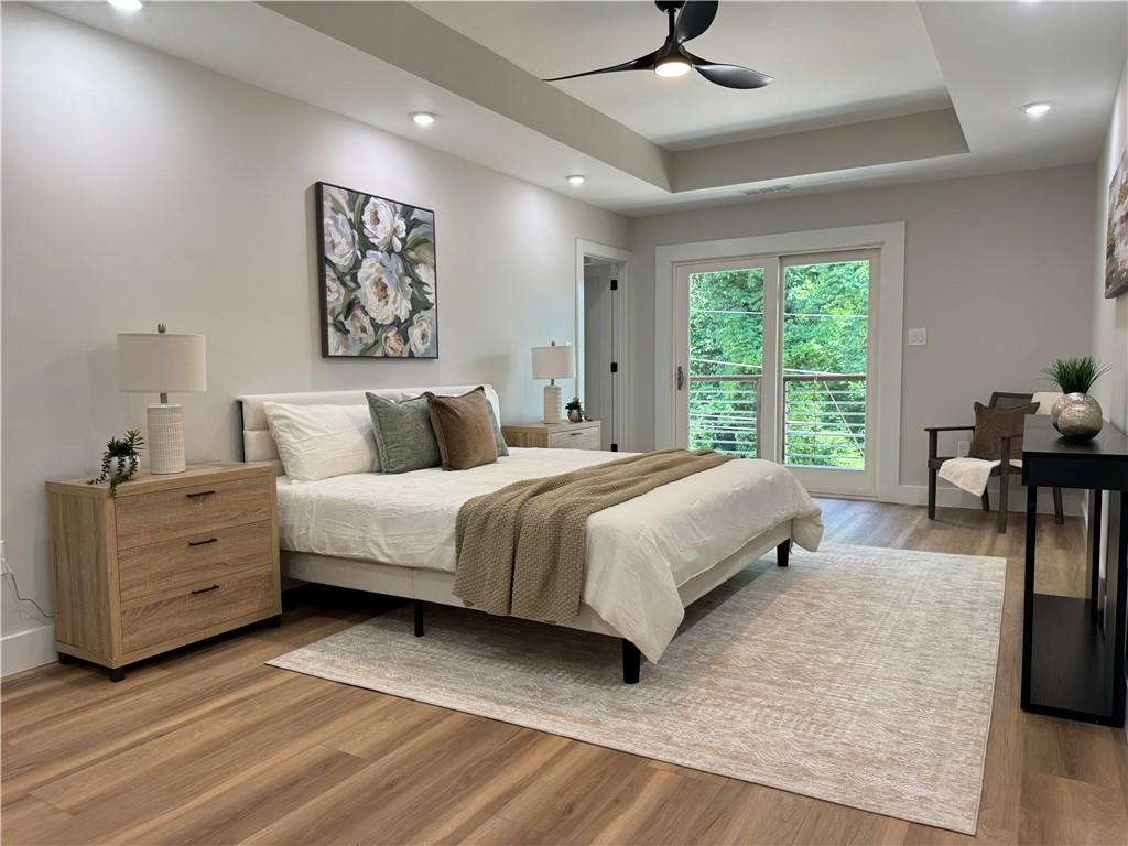 1312 Pine Avenue Atlanta, GA 30344 - Photo 11 of 17 a bedroom with a bed and a large window