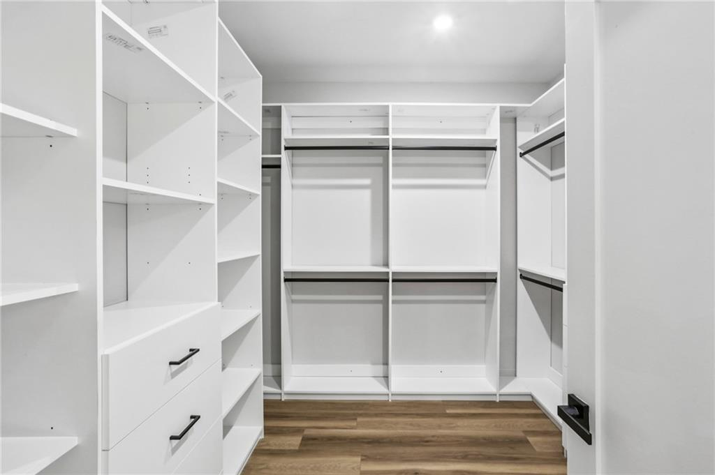 1312 Pine Avenue Atlanta, GA 30344 - Photo 12 of 17 a view of walk in closet with empty racks